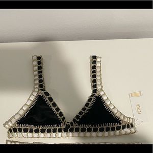 Selling Size: S bikini top. Never worn. With tags.